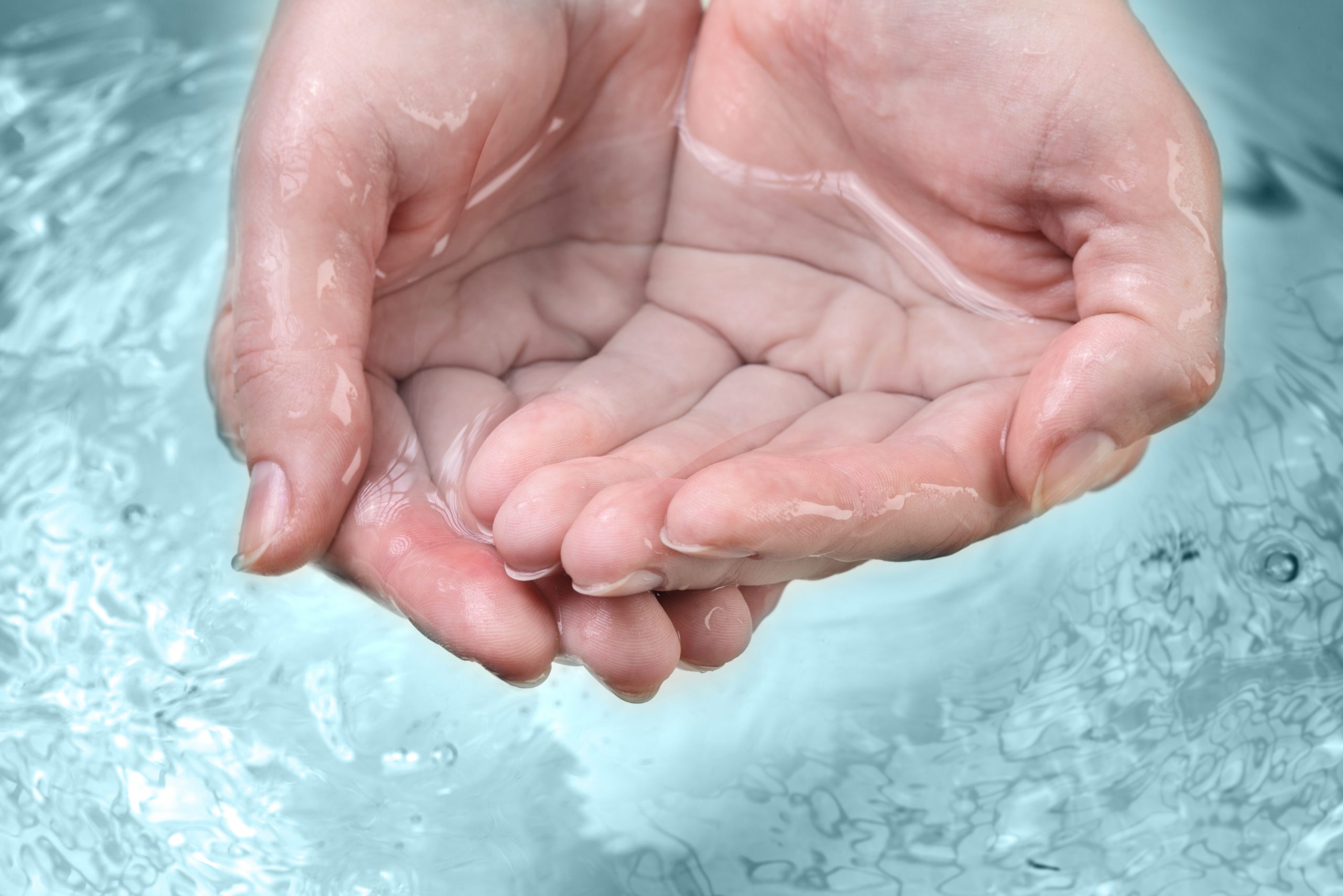 hands cupping water 1